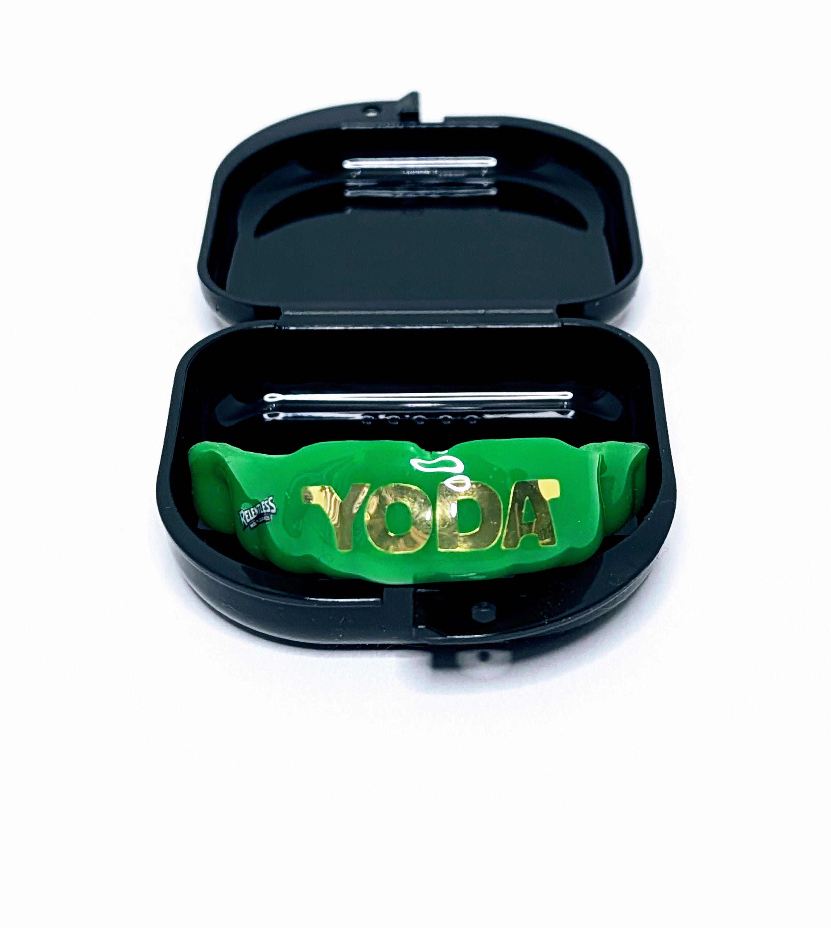 Green custom mouthguard in case